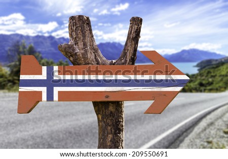Norway wooden sign with a island on background