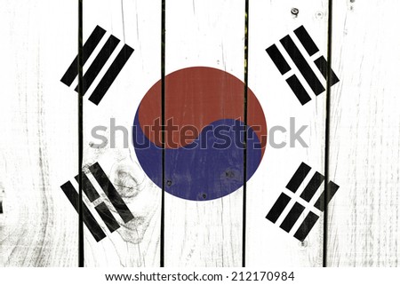 South Korea flag on wooden background