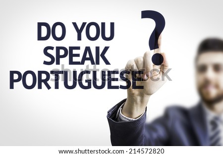 Business man pointing to transparent board with text: Do you Speak Portuguese?