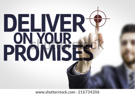 Business man pointing to transparent board with text: Deliver on your Promises