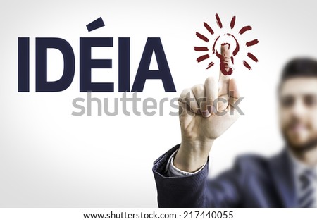 Business man pointing to transparent board with text: Idea (In Portuguese)
