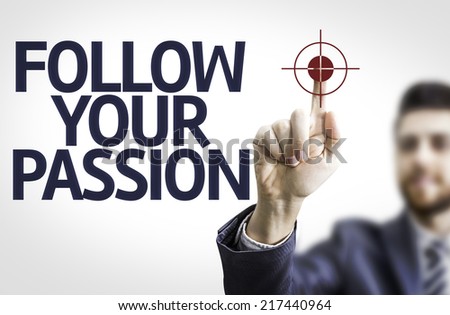 Business man pointing to transparent board with text: Follow your Passion
