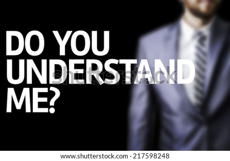 Do You Understand Me? written on a board with a business man on background