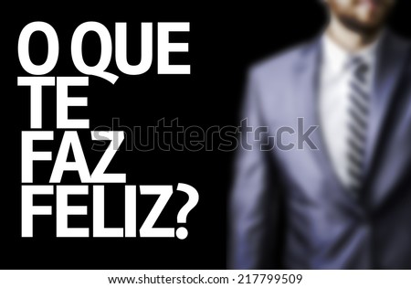 Business man with black board with text: What Makes You Happy? (In Portuguese)