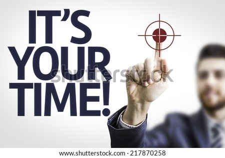 Business man pointing to transparent board with text: It\'s Your Time