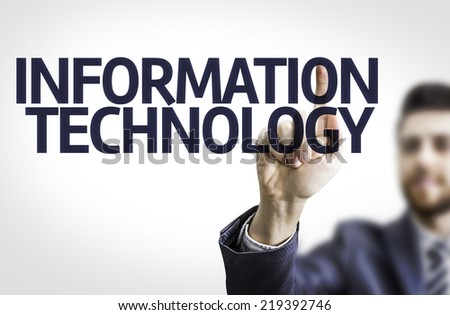 Business man pointing to transparent board with text: Information Technology