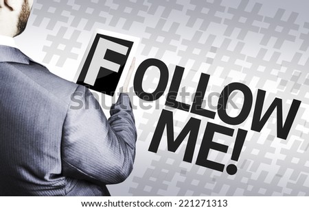 Business man with the text Follow Me in a concept image