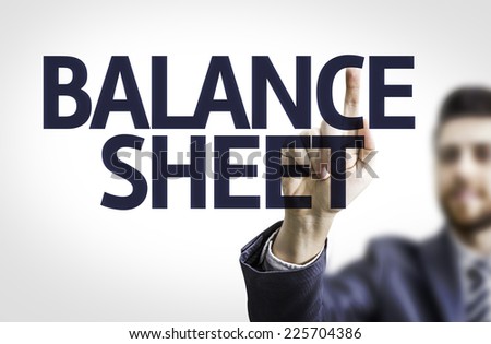 Business man pointing to transparent board with text: Balance Sheet