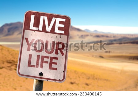 Live Your Life sign with a desert background