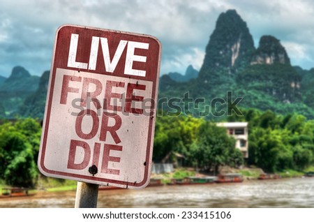 Live Free Or Die sign with a exotic landscape on background