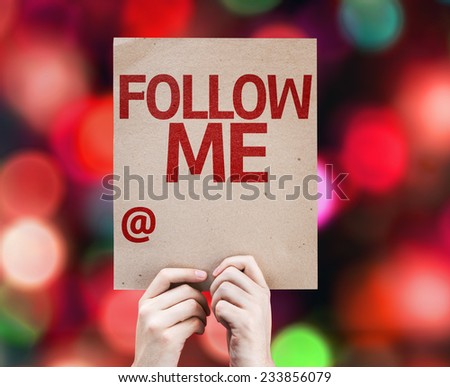 Follow Me with the copy space to put the profile name written on colorful background with defocused lights