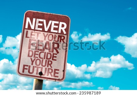 Never Let Your Fear Decide your Future sign with sky background