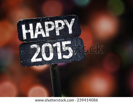 Happy 2015 sign with colorful background with defocused lights