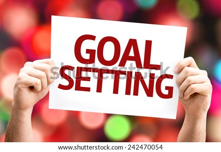 Goal Setting card with colorful background with defocused lights