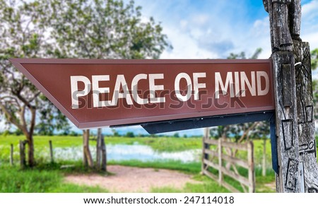 Peace of Mind wooden sign with rural background