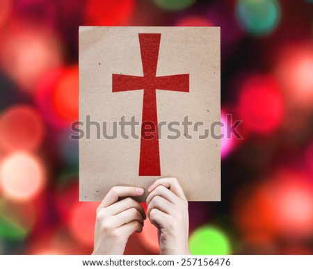 Cross Symbol card with colorful background with defocused lights