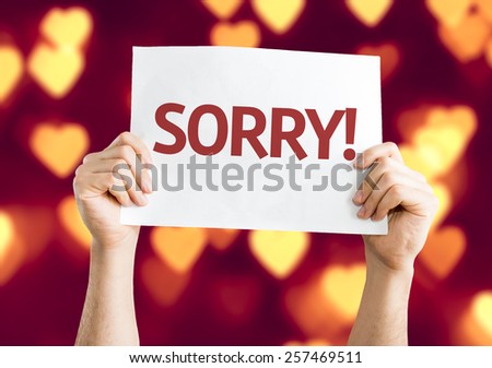 Sorry! card with heart bokeh background