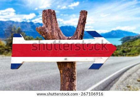 Costa Rica Flag sign with a road background