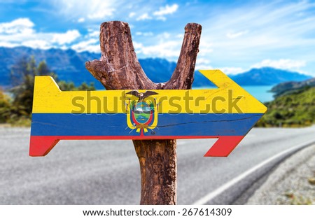 Ecuador Flag wooden sign with road background