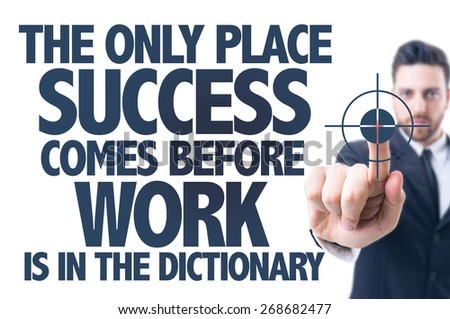 Business man pointing the text: The Only Place Success Comes Before Work is in the Dictionary