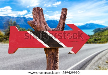 Trinidad and Tobago Flag wooden sign with road background