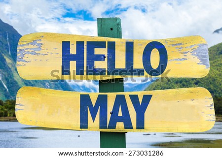 Hello May sign with mountains background