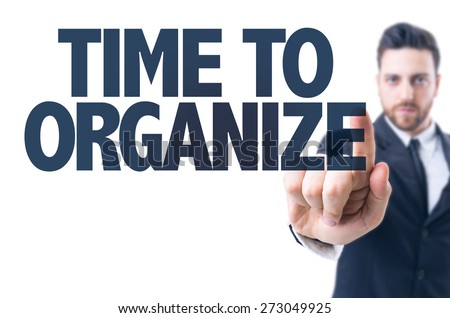 Business man pointing the text: Time to Organize