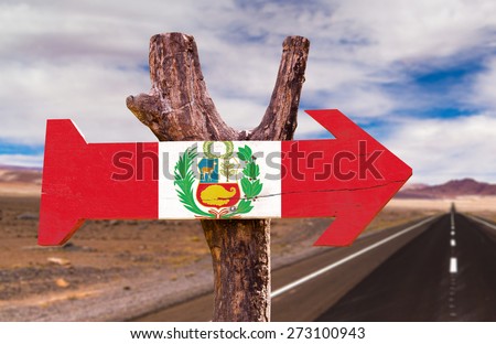 Peru Flag wooden sign with a desert road on background