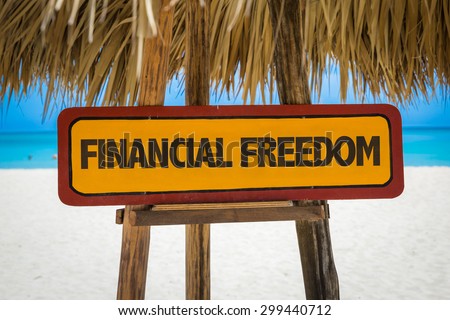 Financial Freedom sign with beach background
