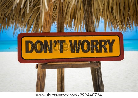 Don\'t Worry sign with beach background