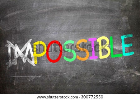 Impossible/Possible written on a chalkboard