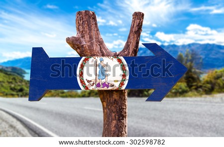 Virginia Flag wooden sign with highway on background