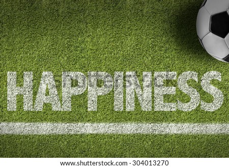 Soccer field with the text: Happiness