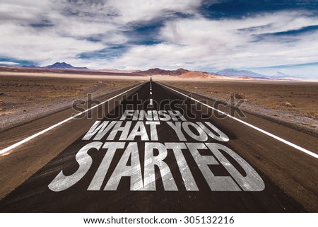 Finish What You Started written on desert road