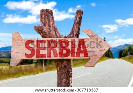 Serbia wooden sign with road background