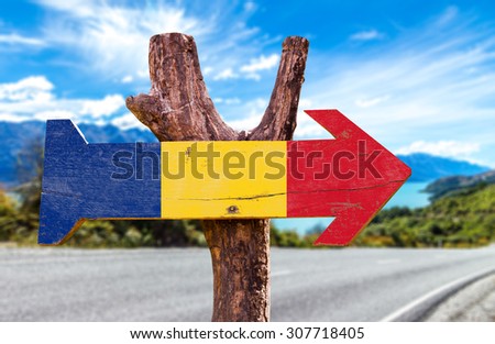 Romania Flag wooden sign with road background