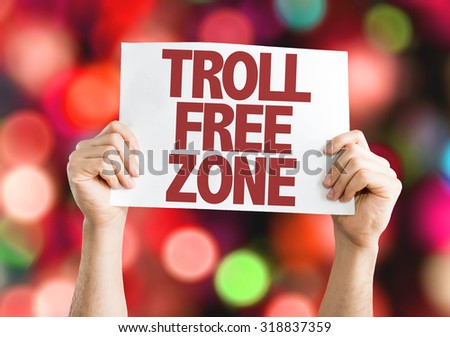 Troll Free Zone placard with bokeh background