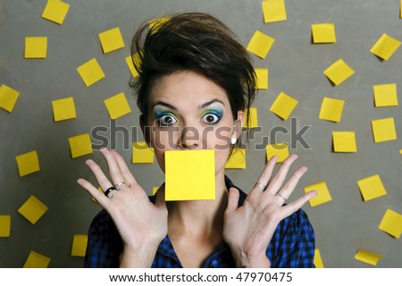 Pretty fashion model with hundreds of post it notes