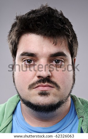 Normal man with beard poses for fine art portrait