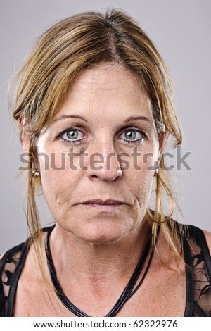 Brunette older woman portrait, high detail, wrinkles and blemishes