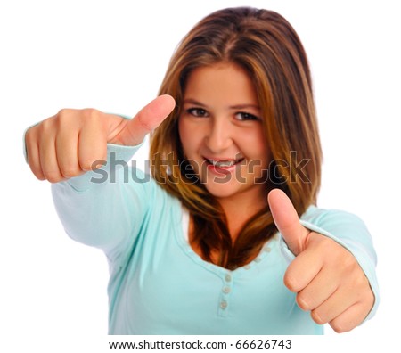 Young isolated teengaer have both her thumbs up to express positivity