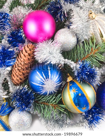 New Year\'s christmas ornaments spheres on green coniferous branches