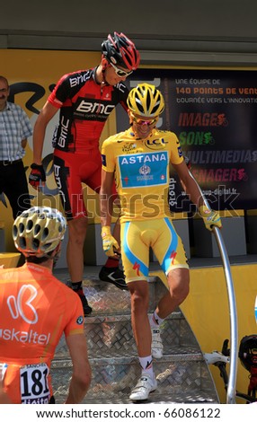 BORDEAUX - JULY 23: Cyclist Alberto Contador is on the podium before start of the 18 stage of Tour de France 2010 in yellow jersey, July 23, 2010 Tour de France in Bordeaux.