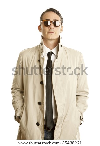 fashion young man with sunglasses and trench coat