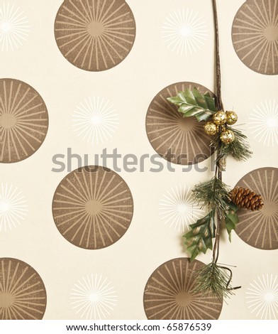 christmas branch decoration on funky wallpaper background