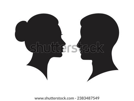 Male and female heads facing silhouette