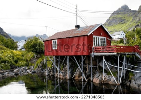 Similar – Foto Bild Skandinavische Häuser am Ufer des schmalsten Fjords in Norwegen