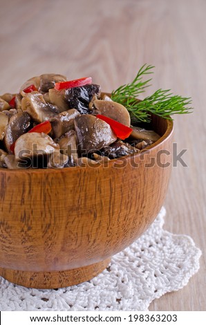 chopped and cooked mushrooms behind the plate