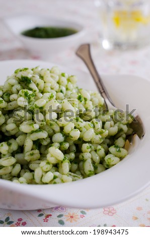 cooked pearl barley, mixed with green sauce
