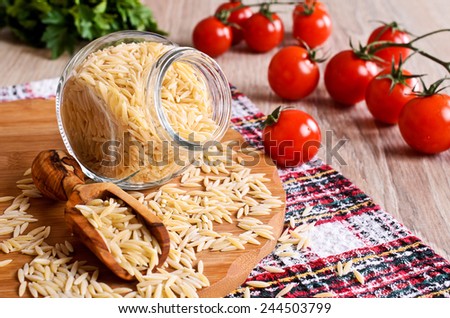 Pasta Orzo not prepared. Is in a glass jar.